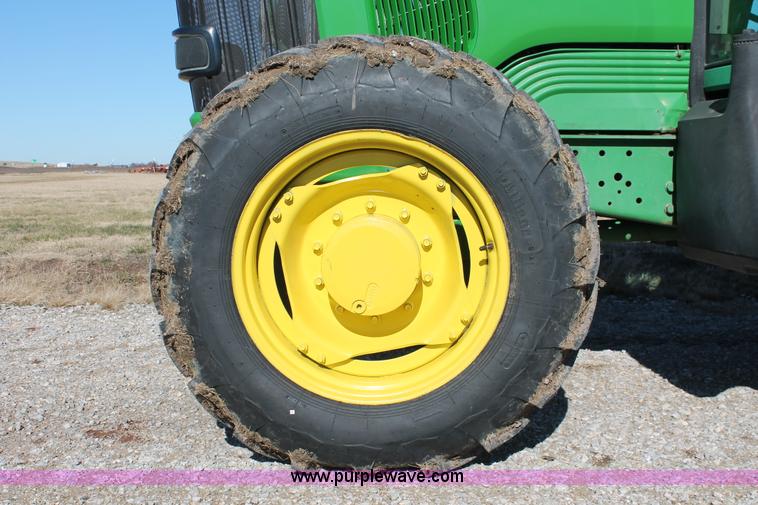 image for item H5509 2007 John Deere 6615 MFWD tractor