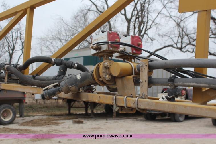 image for item I5959 2002 Ag-Chem RoGator 854 self-propelled sprayer