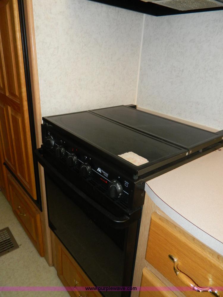 image for item AQ9438 1998 Ex-Cel E325TRW camper