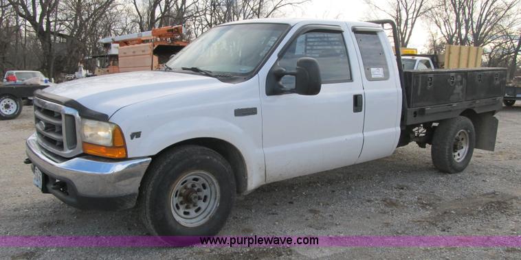 image for item F8896 2002 Ford F250 Super Duty XL flatbed pickup truck