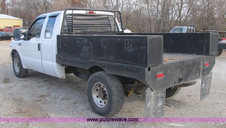 image for item F8896 2002 Ford F250 Super Duty XL flatbed pickup truck