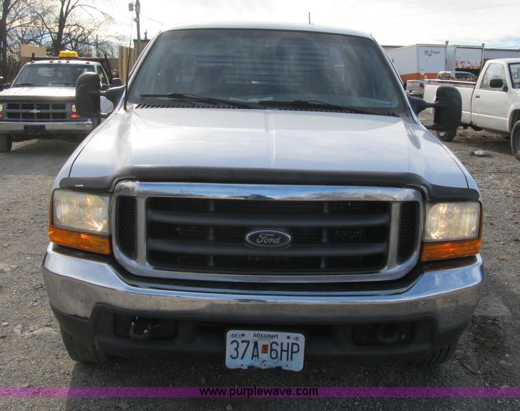 image for item F8896 2002 Ford F250 Super Duty XL flatbed pickup truck