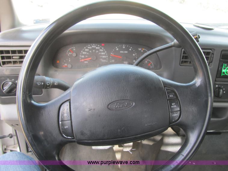 image for item F8896 2002 Ford F250 Super Duty XL flatbed pickup truck