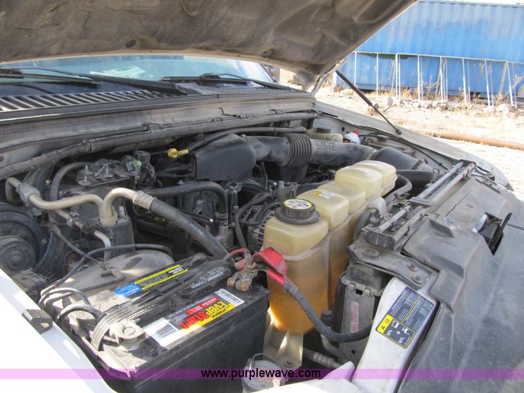 image for item F8896 2002 Ford F250 Super Duty XL flatbed pickup truck