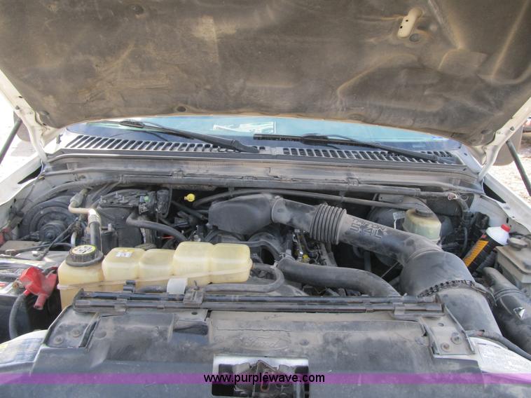 image for item F8896 2002 Ford F250 Super Duty XL flatbed pickup truck