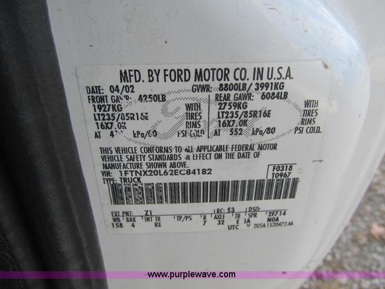 image for item F8896 2002 Ford F250 Super Duty XL flatbed pickup truck