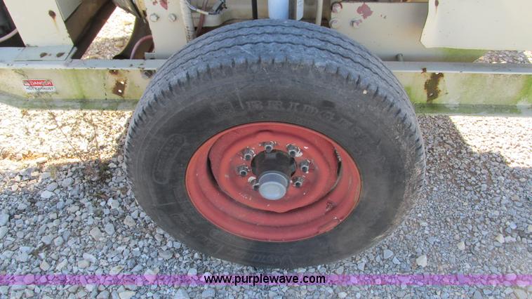 image for item I3179 Finn B260 straw blower trailer