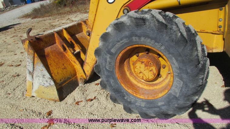 image for item I3182 1999 John Deere 310SE backhoe