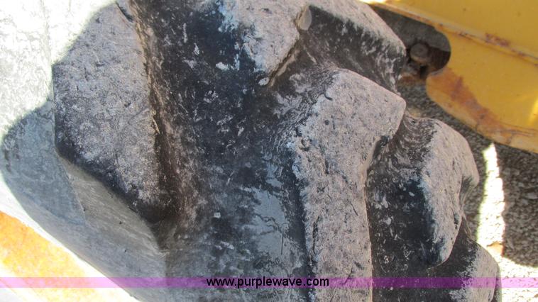 image for item I3182 1999 John Deere 310SE backhoe