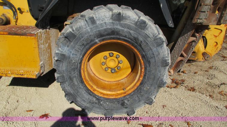 image for item I3182 1999 John Deere 310SE backhoe