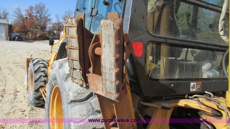 image for item I3182 1999 John Deere 310SE backhoe