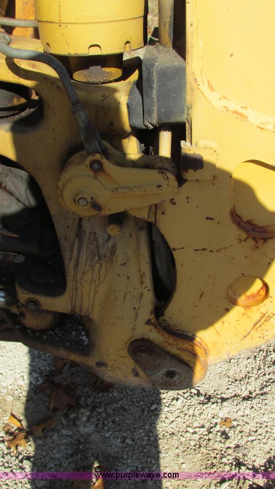 image for item I3182 1999 John Deere 310SE backhoe