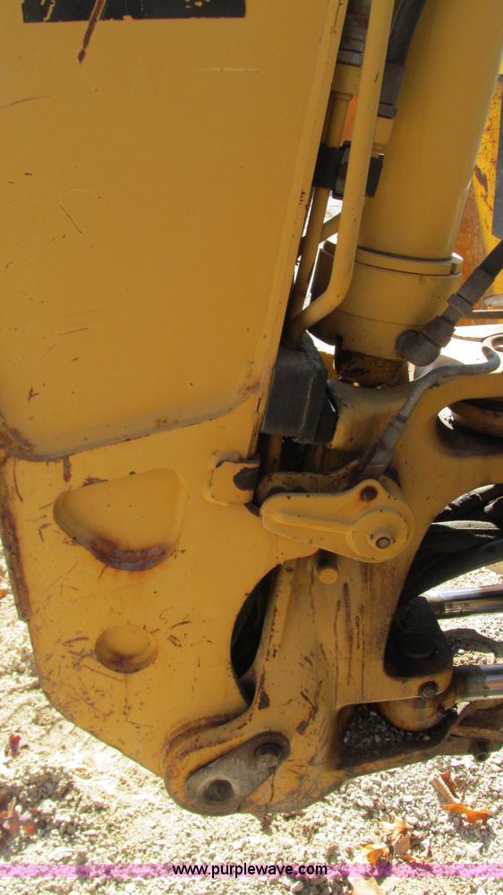 image for item I3182 1999 John Deere 310SE backhoe