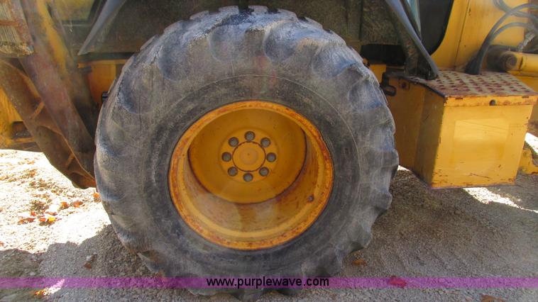 image for item I3182 1999 John Deere 310SE backhoe