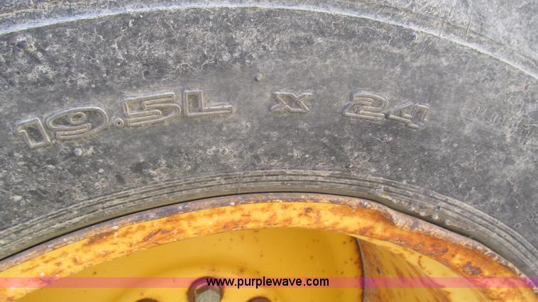 image for item I3182 1999 John Deere 310SE backhoe