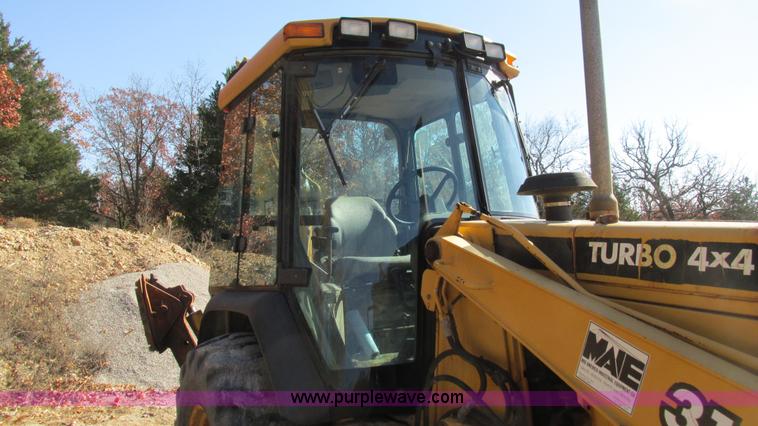 image for item I3182 1999 John Deere 310SE backhoe