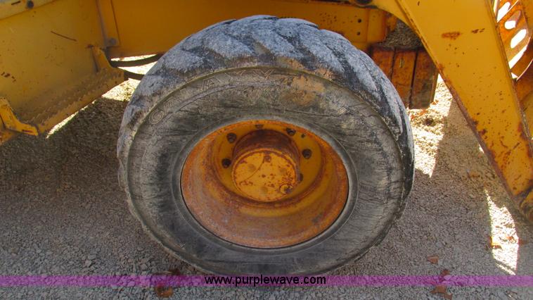 image for item I3182 1999 John Deere 310SE backhoe