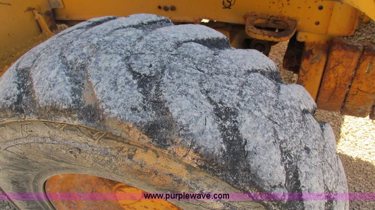 image for item I3182 1999 John Deere 310SE backhoe