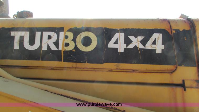 image for item I3182 1999 John Deere 310SE backhoe