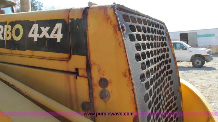 image for item I3182 1999 John Deere 310SE backhoe