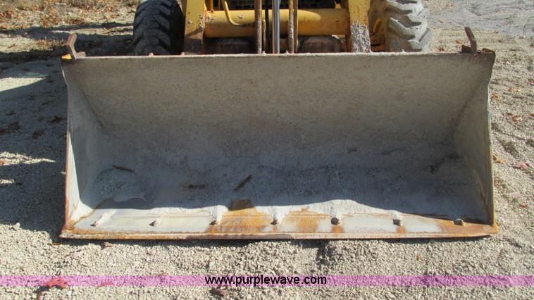 image for item I3182 1999 John Deere 310SE backhoe