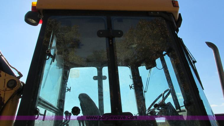 image for item I3182 1999 John Deere 310SE backhoe