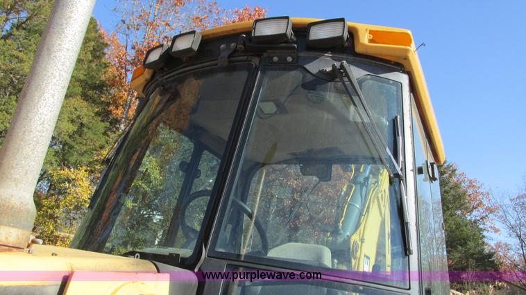 image for item I3182 1999 John Deere 310SE backhoe