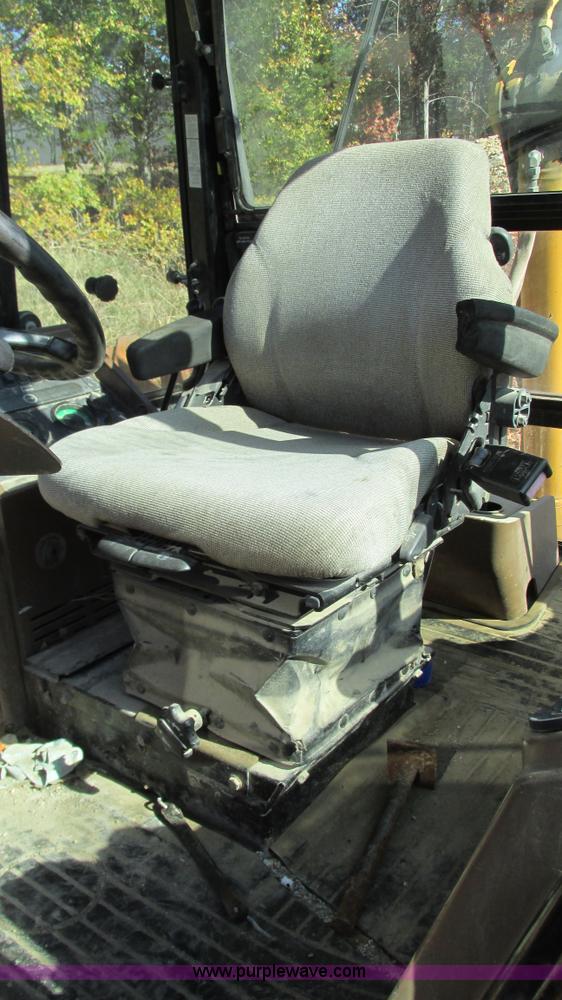 image for item I3182 1999 John Deere 310SE backhoe