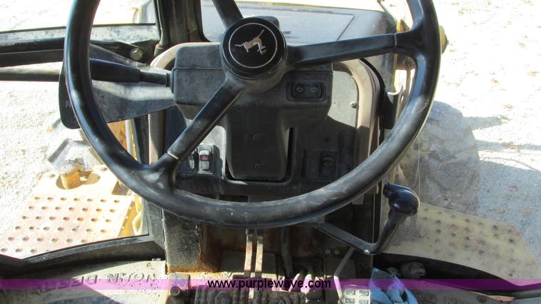 image for item I3182 1999 John Deere 310SE backhoe