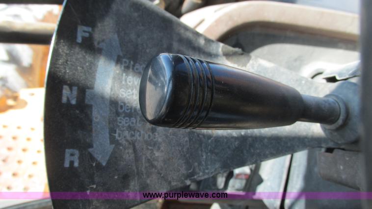 image for item I3182 1999 John Deere 310SE backhoe