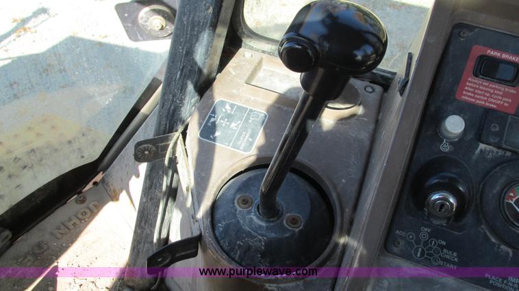 image for item I3182 1999 John Deere 310SE backhoe