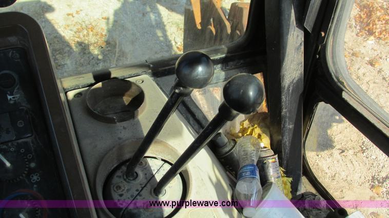 image for item I3182 1999 John Deere 310SE backhoe