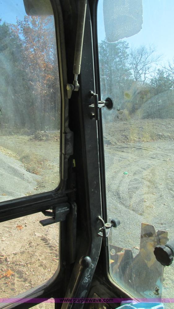 image for item I3182 1999 John Deere 310SE backhoe