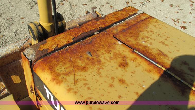 image for item I3182 1999 John Deere 310SE backhoe