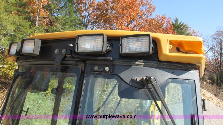 image for item I3182 1999 John Deere 310SE backhoe