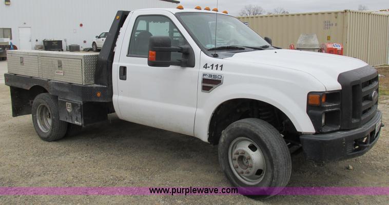 image for item I8878 2009 Ford F350 Super Duty flatbed pickup truck