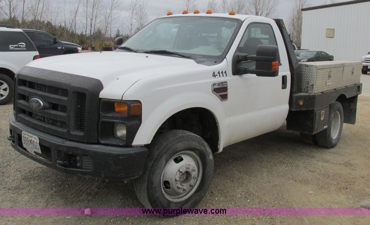 image for item I8878 2009 Ford F350 Super Duty flatbed pickup truck