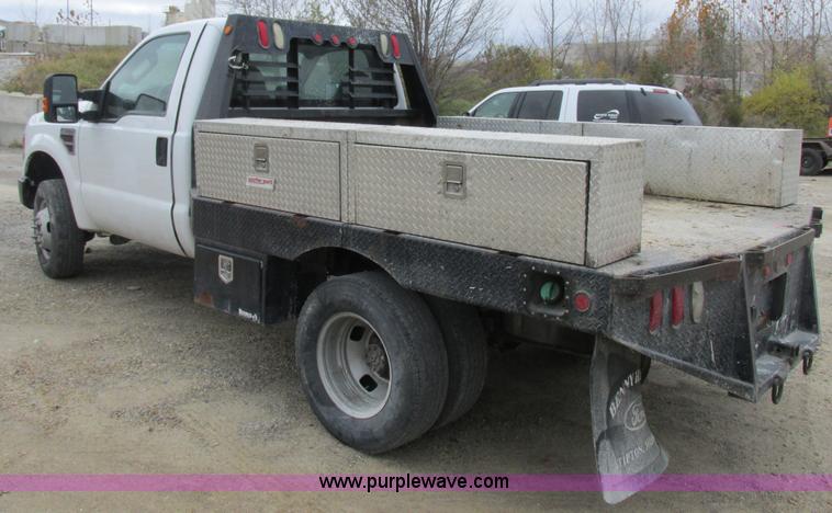 image for item I8878 2009 Ford F350 Super Duty flatbed pickup truck
