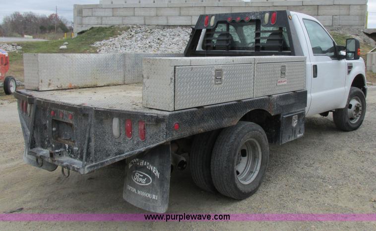 image for item I8878 2009 Ford F350 Super Duty flatbed pickup truck