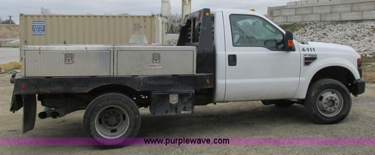 image for item I8878 2009 Ford F350 Super Duty flatbed pickup truck