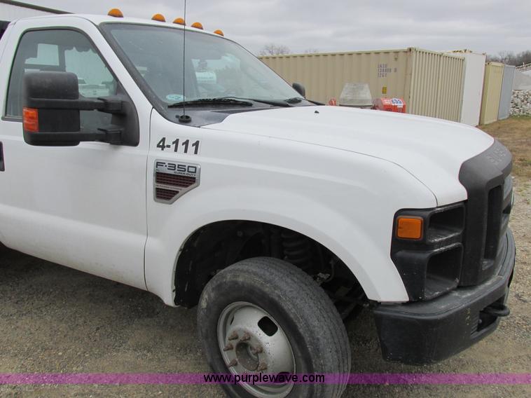 image for item I8878 2009 Ford F350 Super Duty flatbed pickup truck