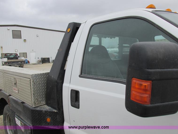 image for item I8878 2009 Ford F350 Super Duty flatbed pickup truck