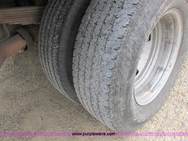 image for item I8878 2009 Ford F350 Super Duty flatbed pickup truck