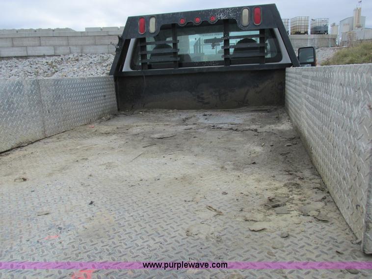 image for item I8878 2009 Ford F350 Super Duty flatbed pickup truck