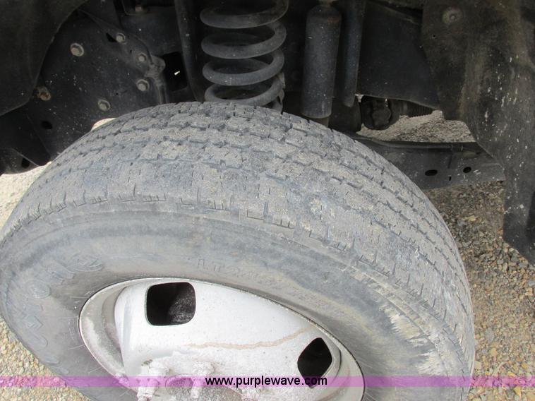 image for item I8878 2009 Ford F350 Super Duty flatbed pickup truck