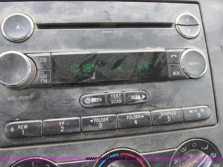 image for item I8878 2009 Ford F350 Super Duty flatbed pickup truck