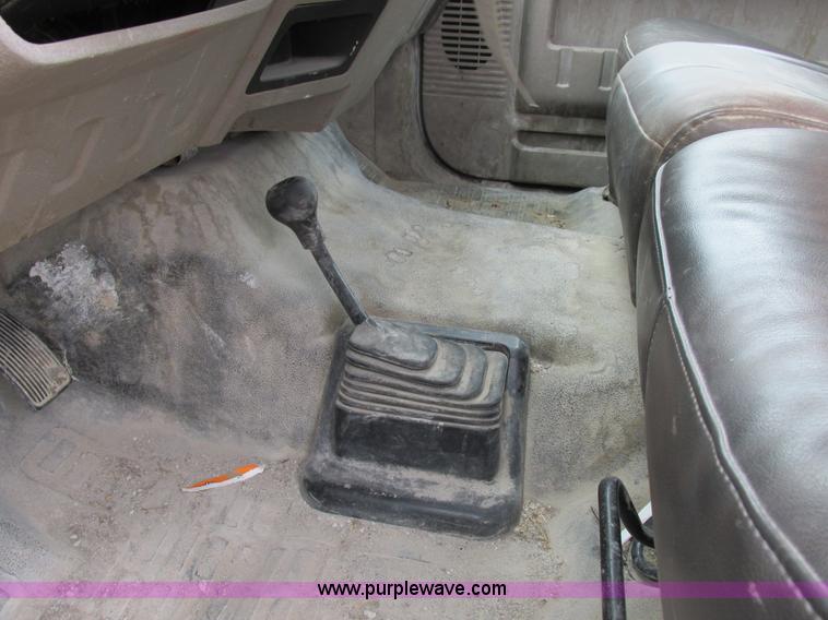 image for item I8878 2009 Ford F350 Super Duty flatbed pickup truck