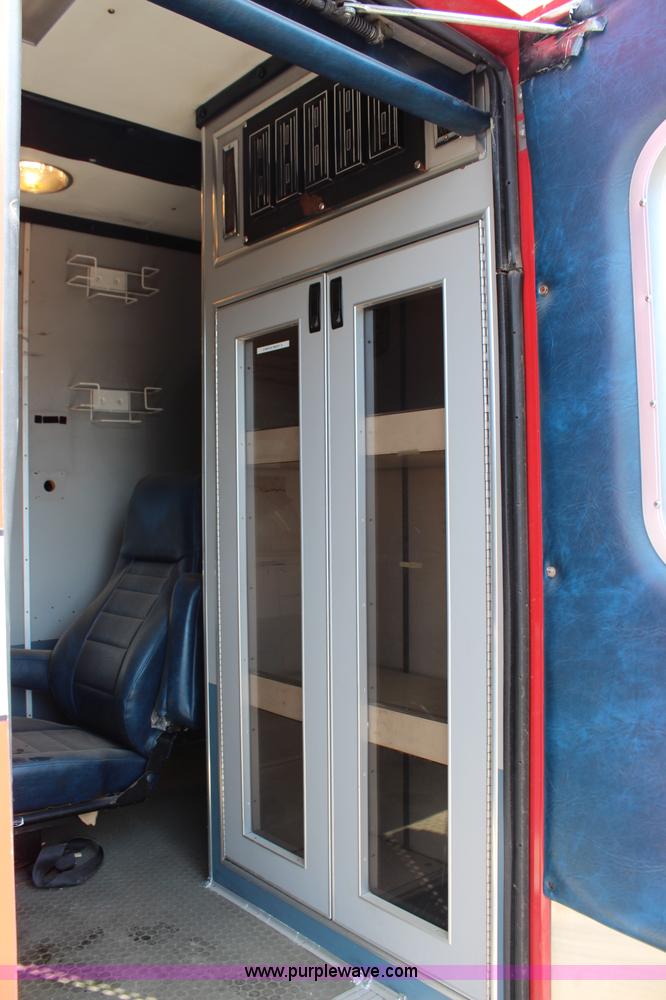 image for item J1140 1997 International 810 ambulance