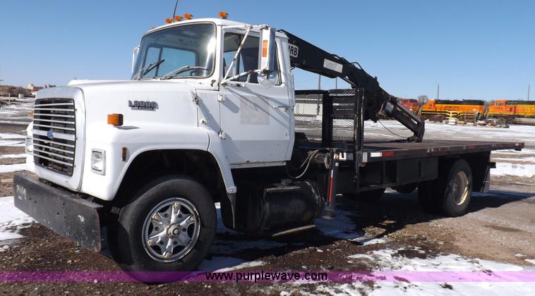 image for item K3032 1987 Ford LN8000 flatbed truck