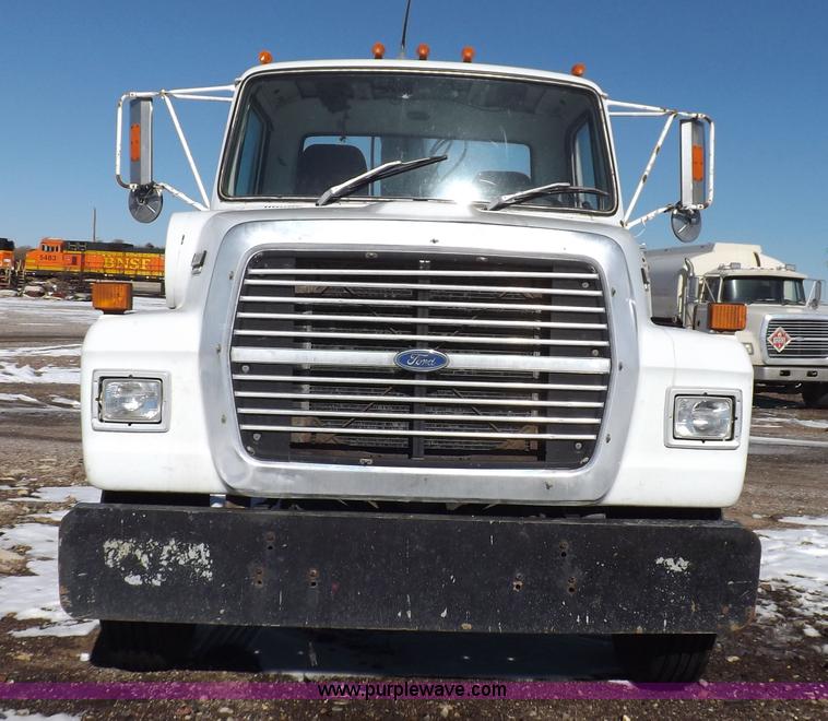 image for item K3032 1987 Ford LN8000 flatbed truck